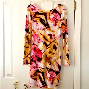 Cheery and bright comfortable fabric dress. Great for a spring or summer event!